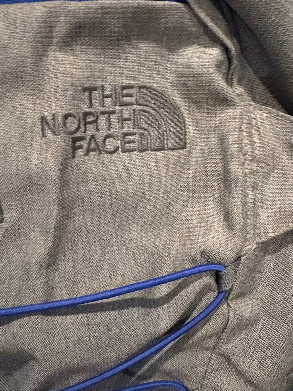The North Face - Borealis Backpack with blue bungee cords.